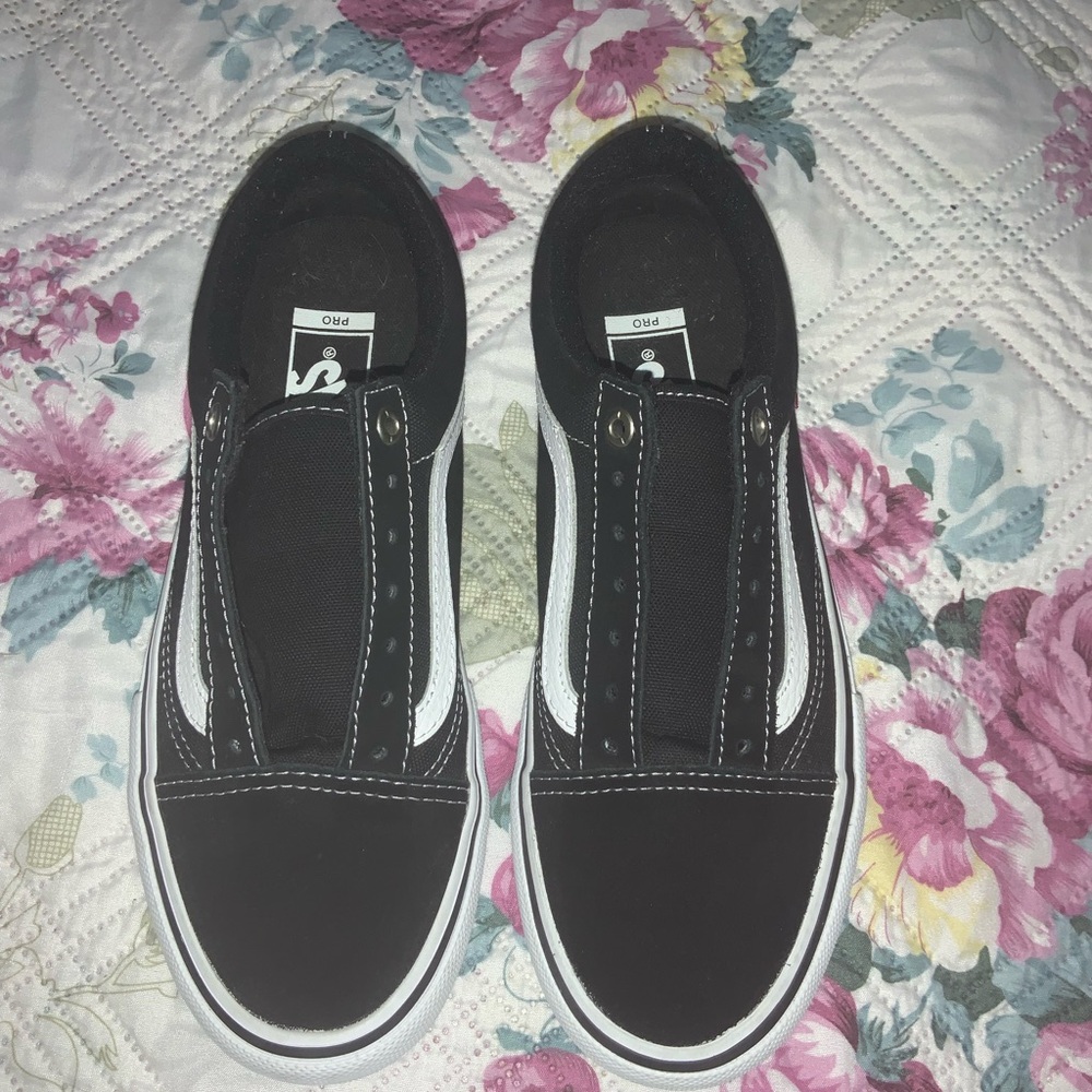 Vans Black and White Pro women 7.5 excellent condition ask any questions.
